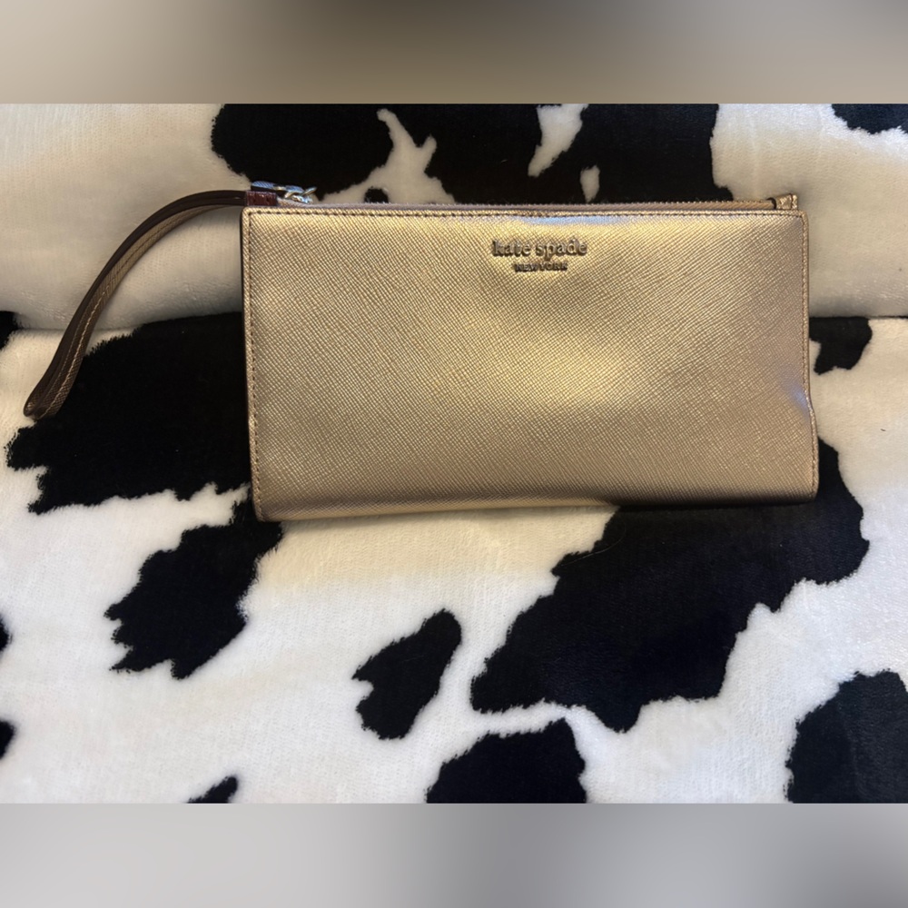 Kate Spade shimmery rose gold wristlet wallet